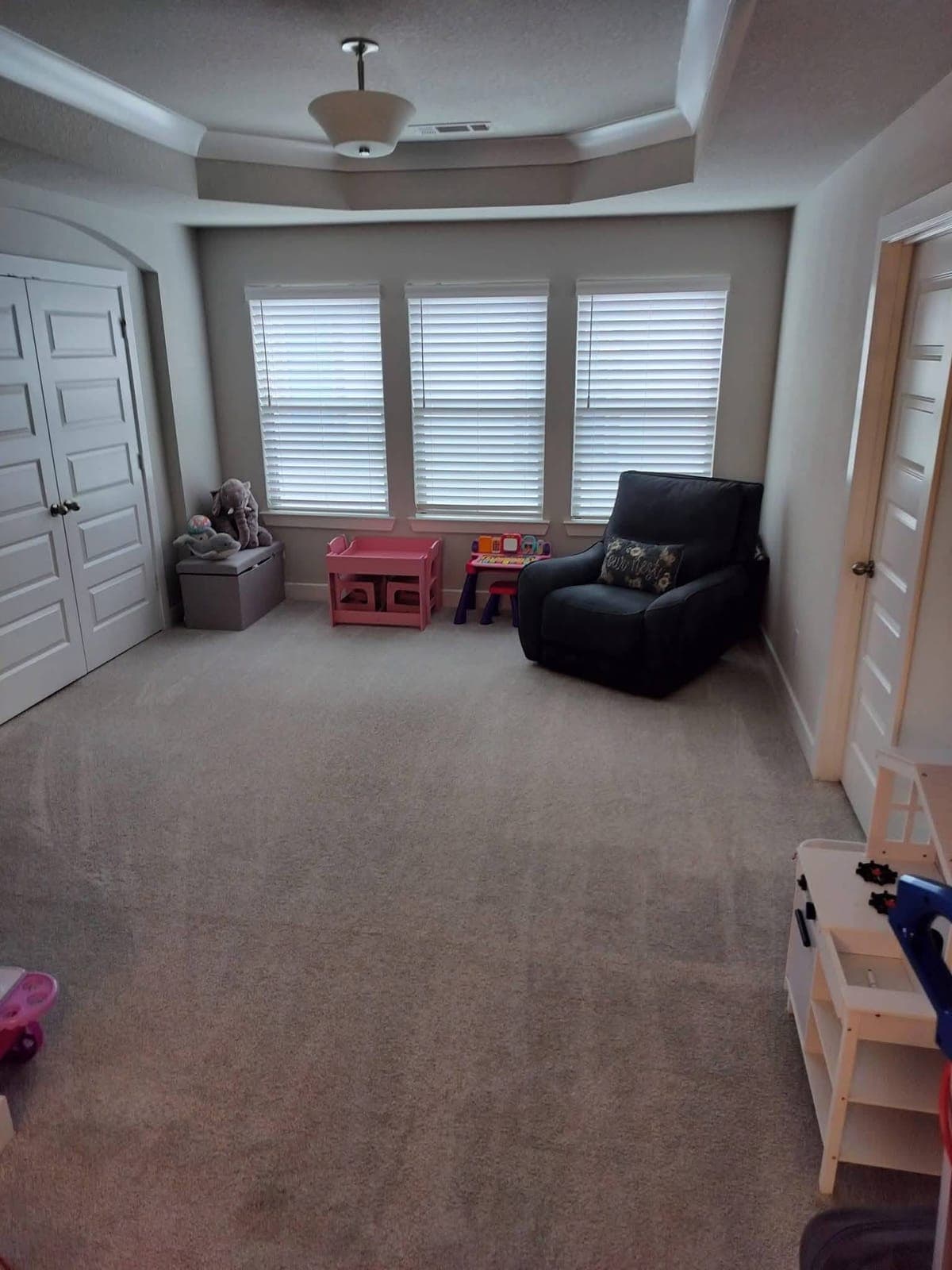Playroom with the carpet vacuumed and everything in place